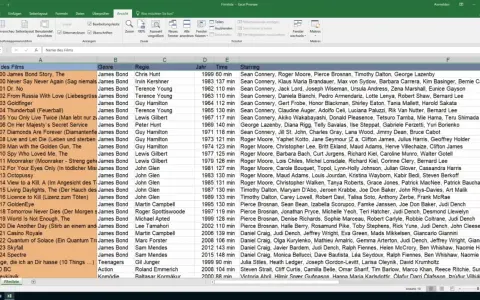 Excel-Tabelle mit Filmliste. "Fenster fixieren" ist in der Menüleiste sichtbar, um die Ansicht zu organisieren.
