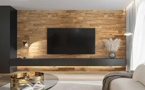 Un salon moderne avec un mur en bois chaleureux servant de **déco derrière télé**. Un meuble bas suspendu et une lampe design complètent l'ensemble.