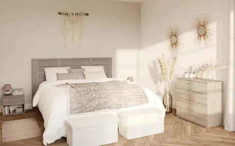 Une chambre beige cocooning avec un lit douillet, des coussins moelleux, une couverture texturée et une décoration murale en macramé.