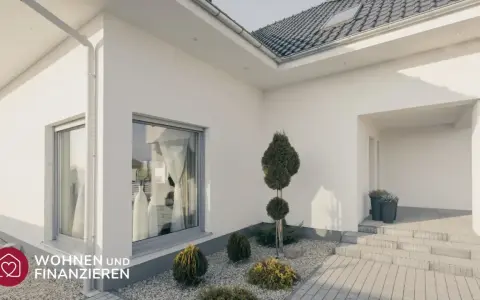 Moderner Bungalow mit großem Fenster und gepflegtem Vorgarten. Hier wird die bungalow definition lebendig.