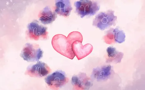 Dwa różowe serca otoczone zodiakalnymi symbolami. Czy to znak, że Rak znalazł idealnego partnera?