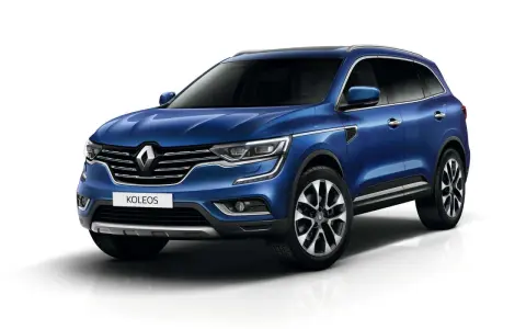 Niebieski Renault Koleos II, który może mieć pewne **awarie i problemy**, prezentuje się elegancko na białym tle.