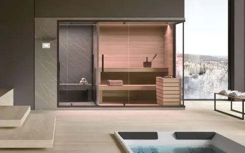 Un'elegante **spa in casa** con sauna in legno, doccia e vista panoramica su un paesaggio innevato.