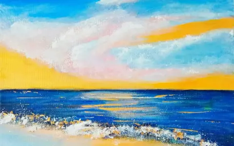 En solnedgång över havet med vågor som slår mot stranden. En vacker inspiration för saker att måla.