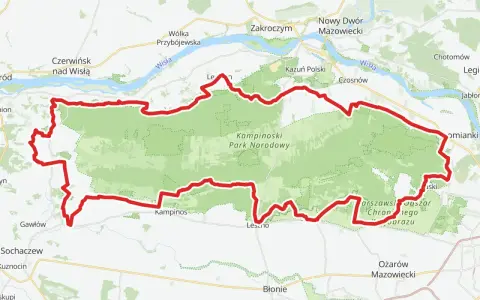 Mapa z zaznaczonym Kampinoskim Szlakiem Rowerowym, biegnącym przez Kampinoski Park Narodowy, w pobliżu Wisły i miejscowości takich jak Zakroczym czy Ożarów Mazowiecki.