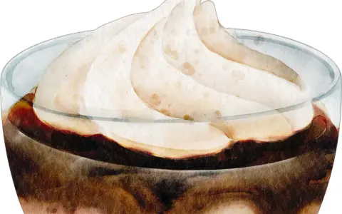 Gourmandise en verre : une onctueuse chantilly au chocolat, aux nuances douces et réconfortantes.