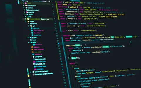 Kod JavaScript w edytorze kodu. Widoczne importy, funkcje i elementy JSX.