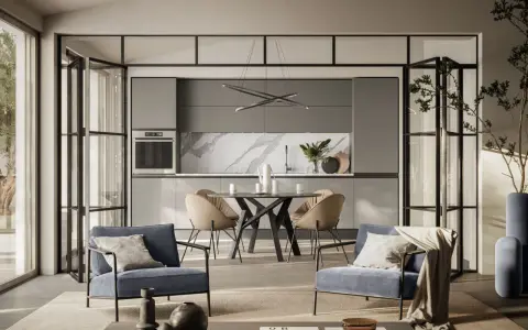 Spazio aperto con cucina moderna e zona relax, dove la cucina e camera da letto insieme creano un ambiente unico e funzionale.
