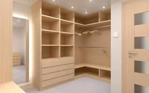 Amplio vestidor de madera clara con estanterías y cajones. Las medidas del vestidor permiten organizar ropa y accesorios.
