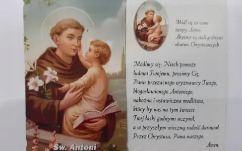 Święty Antoni z Dzieciątkiem Jezus, otoczony kwiatami lilii. Obok tekst modlitwy do świętego Antoniego.