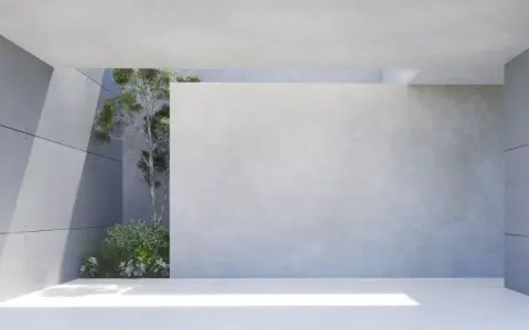 Moderne Architektur mit transluzentem Beton und grüner Vegetation. Sonnenlicht fällt durch eine Öffnung und beleuchtet den Boden.