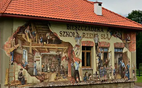 Mural przedstawiający sceny z życia szkoły rzemiosła, z ludźmi pracującymi i uczącymi się.