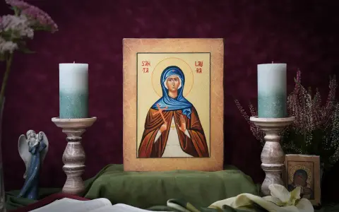 Ikona błogosławionej Jolanty z krzyżem i świecami.