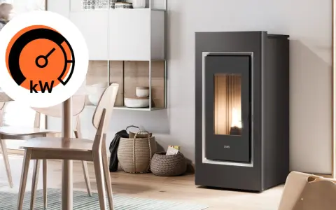 Stufa a pellet moderna con indicatore kW. La scelta del miglior legno per pellet garantisce efficienza e calore.