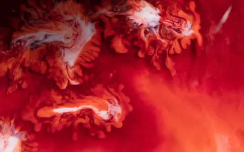 Abstrakte Darstellung von Rot und Weiß, die an die Frage erinnert, wie viel Blut ein Mensch hat.