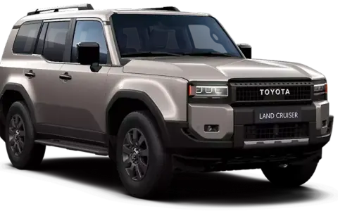 Szary Toyota Land Cruiser 300 z czarnym grillem i napisami TOYOTA LAND CRUISER.