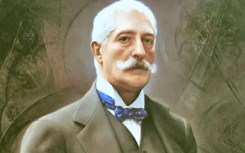 Ritratto di uomo anziano con baffi bianchi, abito scuro e papillon blu. Potrebbe essere un personaggio chiave nel nedda verga riassunto.