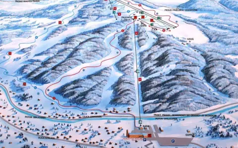 Mapa ośrodka narciarskiego z trasami, wyciągami i budynkami. Widoczna kolejka na Palenicę, szlaki piesze i granica państwa.