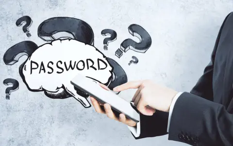 Dłoń trzyma tablet, a nad nim chmurka z napisem "PASSWORD" i znaki zapytania. Jak wymyślić hasło?