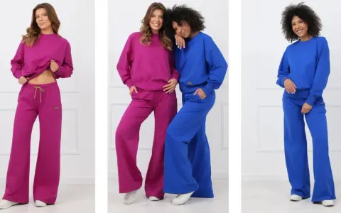 Trzy kobiety prezentują zestawy odzieży w stylu elegancki sportowy: fuksjowe i niebieskie dresy z szerokimi nogawkami.