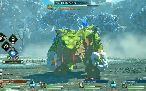 En Monster Hunter Stories 3, un Feral Chatacabra verde y rocoso se enfrenta a un equipo.