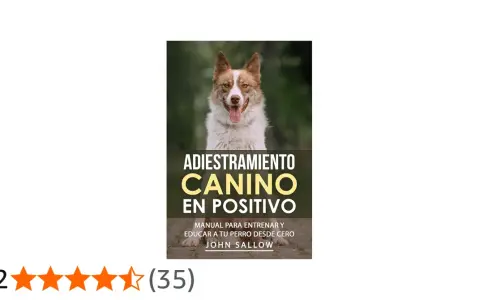 Un perro feliz sonríe en la portada de "Adiestramiento Canino en Positivo", un manual para el entrenamiento de perros.
