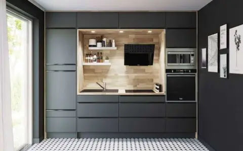 Cuisine moderne avec électroménagers encastrables et intégrables. La différence est subtile, mais l'intégration est plus discrète.