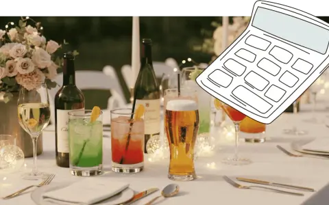 Hochzeitstisch mit Getränken und einer Rechner-Grafik. Hilft bei der Planung: wie viel wein pro person hochzeit.