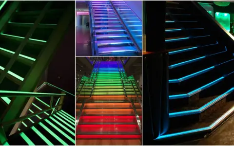 Schody z zielonym, tęczowym i niebieskim podświetleniem pokazują różnicę między RGB a RGBW w oświetleniu.