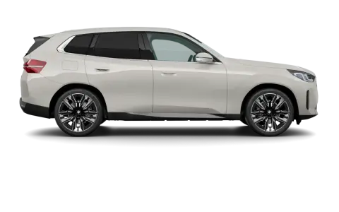 El mejor BMW, un SUV blanco elegante con llantas deportivas, se presenta en un fondo negro, listo para la aventura.