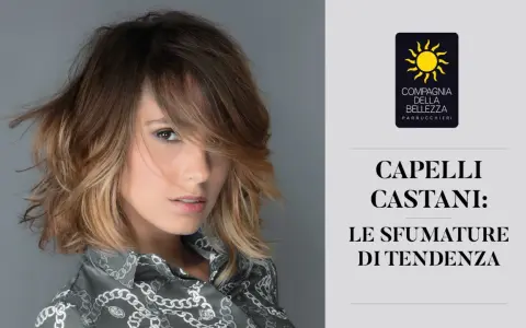 Modella con capelli castani sfumati, un esempio di tabella colori capelli castani con tonalità di tendenza.