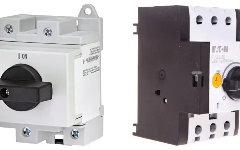 Dwa rodzaje bezpieczników elektrycznych: ETI z czarnym pokrętłem ON/OFF i Eaton P-SOL20.