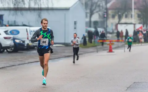 Runner with bib number 88 in a race.