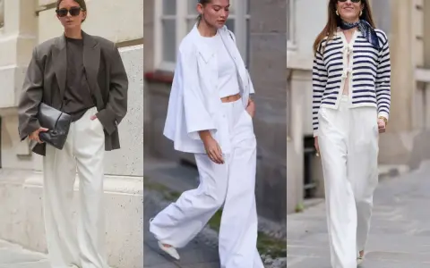 Trzy kobiety prezentują białe spodnie w eleganckich stylizacjach. Jedna w brązowej marynarce, druga w białym komplecie, trzecia w granatowo-białym sweterku.