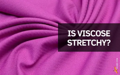 A close-up of a vibrant purple fabric with soft folds. Text overlay asks: "IS VISCOSE STRETCHY?