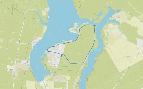 Mapa turystyczna z zaznaczoną trasą wokół **zalewu Koronowskiego**. Widoczne drogi, zabudowania i linie brzegowe.