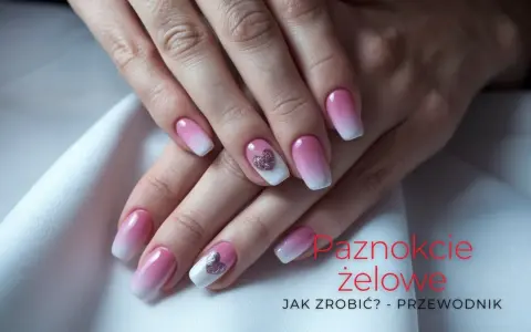 Eleganckie paznokcie żelowe w stylu ombre z błyszczącymi serduszkami.
