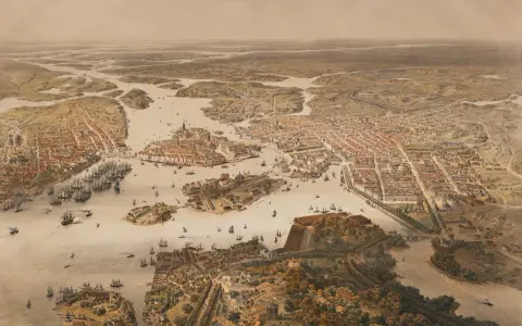 Vy över Stockholm med många fartyg i hamnen, en vy som ger en känsla av stockholms historia och stadens utveckling genom tiderna.