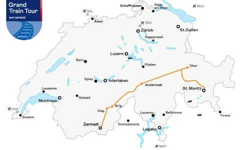 Map showing the Grand Train Tour of Switzerland. The route from Zermatt to Lugano is highlighted in orange, passing through Visp, Brig, Andermatt, and Locarno.