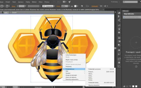 Ilustrator tworzy pszczołę i plaster miodu. Menu kontekstowe pokazuje opcje transformacji.