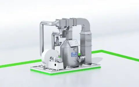 Industrielle Anlage mit Lüftungsrohren und einem zylindrischen Behälter, auf dem "DÜRR" steht. Dies ist ein Katalyse-Ofen zur Abgasreinigung.