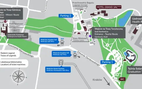 Mapa Kopalni Soli Wieliczka z zaznaczonym parkingiem, wejściami na trasy, kasami biletowymi i atrakcjami.