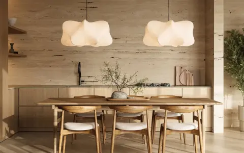 Ein Essbereich im **scandinavian style** mit Holztisch, Stühlen und Hängeleuchten. Natürliche Materialien und helle Farben schaffen eine ruhige Atmosphäre.