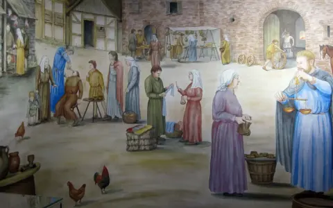 Auf einer Burg lebten Menschen verschiedenster Berufe: Händler, Schmiede und Bauern. Hier ein lebhaftes Markttreiben.