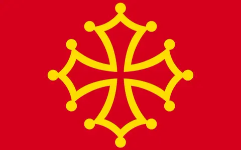 Bandera roja con una cruz amarilla de Occitania, símbolo de la lengua de oil hablada en regiones de Francia.