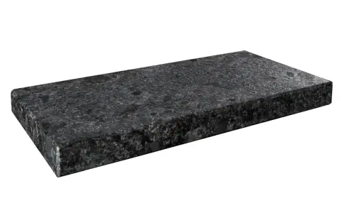 Ciemny granit o bogatych, złożonych granit kolorach, z widocznymi kryształkami.