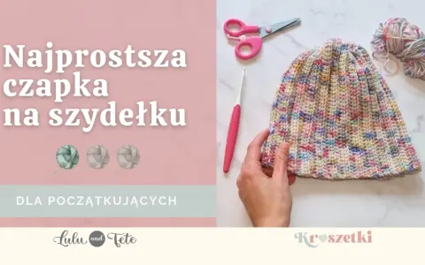 Kolorowa czapka na szydełku, gotowa do noszenia. Obok szydełko, nożyczki i motek włóczki. Idealna dla początkujących!