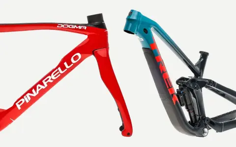Red Pinarello carbon frame vs. teal Trek mountain bike frame.