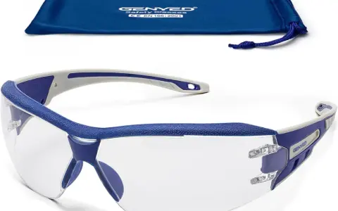 Gafas de seguridad transparentes con montura azul y gris, cumplen la norma EN 166. Incluyen bolsa de tela azul.