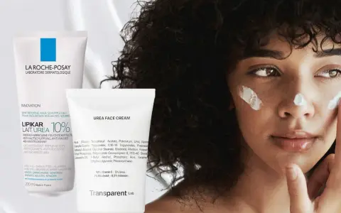 Eine Frau mit lockigem Haar trägt Gesichtscreme auf. Links sind zwei Tuben zu sehen, eine mit "Urea 10%" und eine mit "Urea Face Cream".